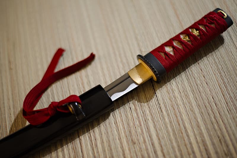 Tantō (短刀) sharp with scabbard (saya 鞘) black, comes with protective cloth cover | The blood of my enemies has flowed, soaking the earth with this elixir of life. I've fought so many battles it's impossible to count. I've defended and protected the weak. Extending their warrior spirit, I've armed samurai for epic duels and battles. I never wavered, breaking the blades of my adversaries or severing the limbs of the most aggressive.
