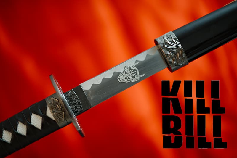 Collector's Katana inspired by Quentin Tarantino's film "Kill Bill", delivered with presentation stand | I served him without worrying about the legitimacy of his actions. I cut off limbs, took lives time and time again. Forged by Hattori Hanzō, I was the extension of his arms, the blade that embodied his boundless ambition.