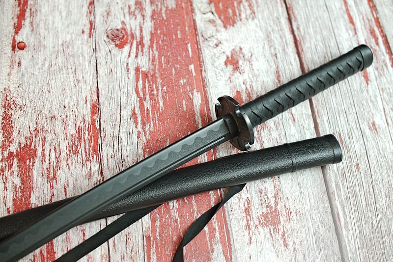 Training sword with scabbard and removable tsuba | The material I'm made from is modern, but its qualities give me both great strength and a lightness much appreciated by practitioners.