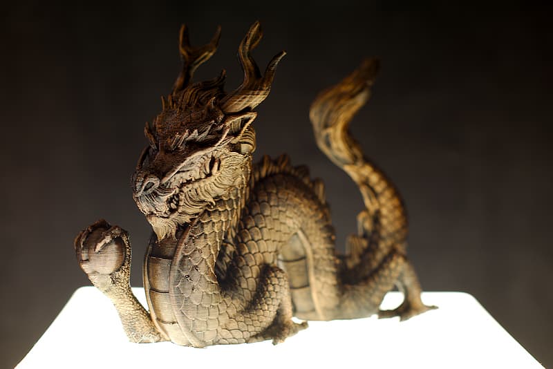 3D-printed collector's item, hand-finished, aged bronze look | I am a Tianlong, or Tien-Long, celestial dragon or sky dragon. I am a guardian and represent wisdom, strength and happiness. I am the embodiment of the higher essence of all things.