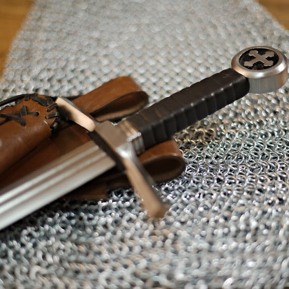 Medieval Crusader knight's sword (striking sword with trefoil cross pommel and brown leather scabbard, slanting)