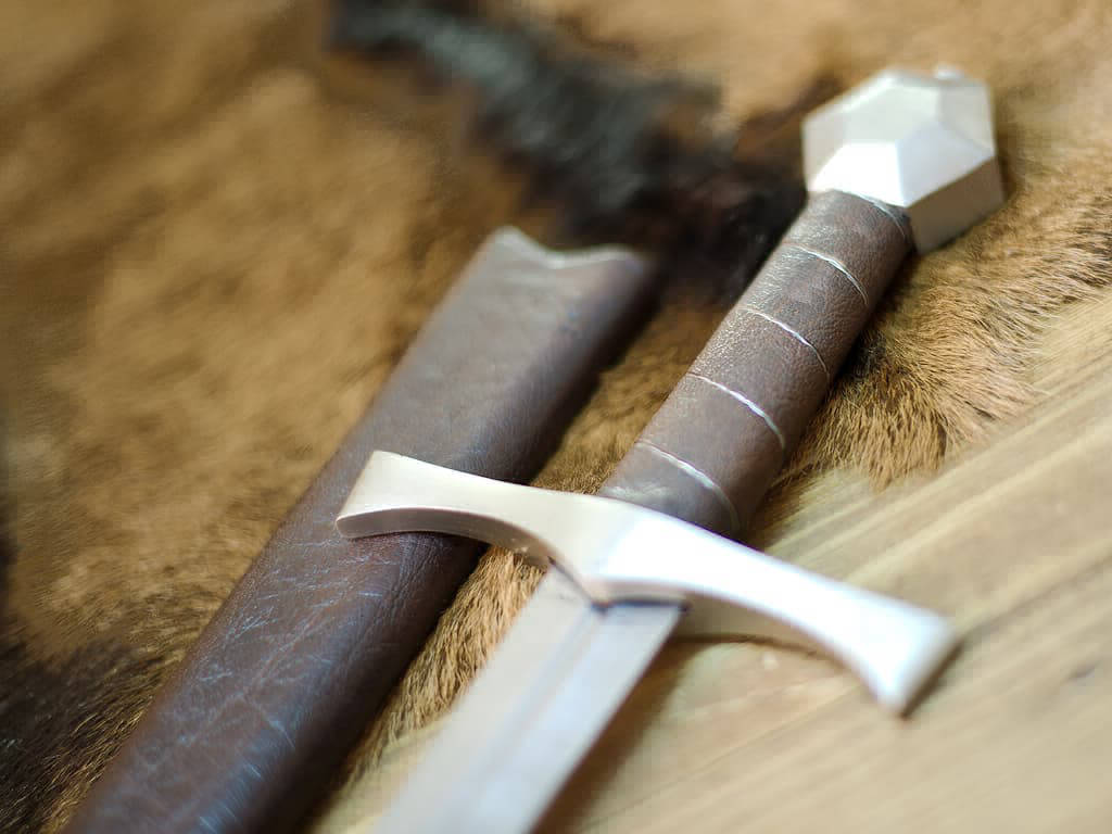 Medieval "Lightbane" combat dagger on natural skin