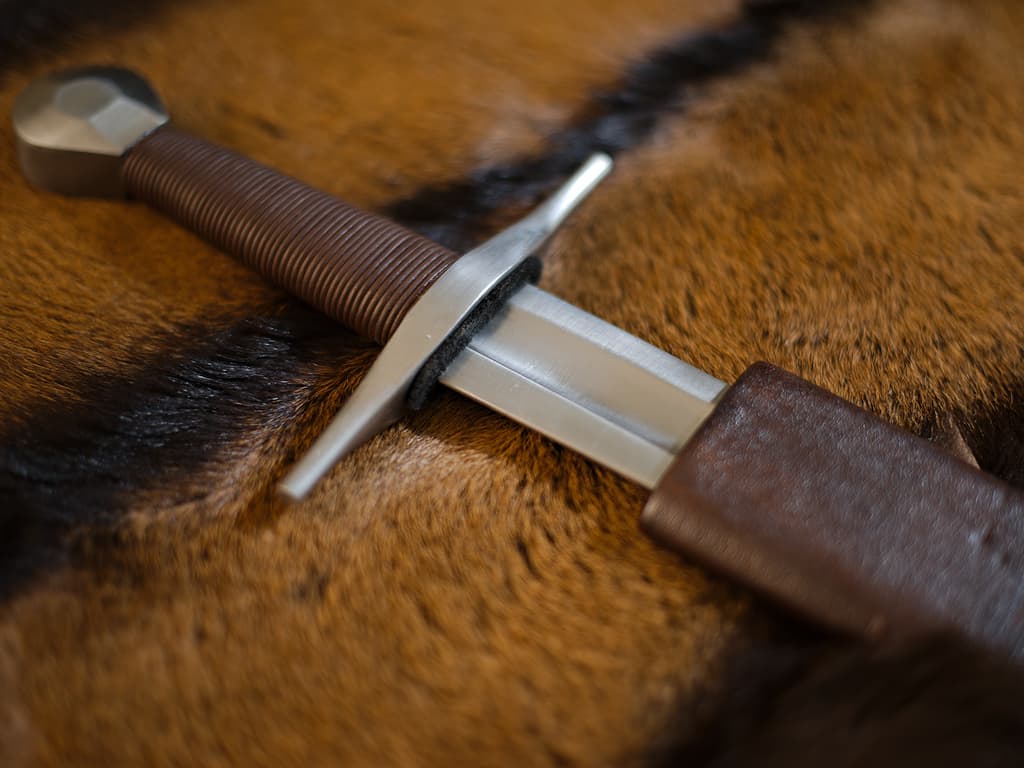 Medieval crossed knight's sword set on natural vertical stones Forged medieval sword "Courageuse" ⚔ #Terressens