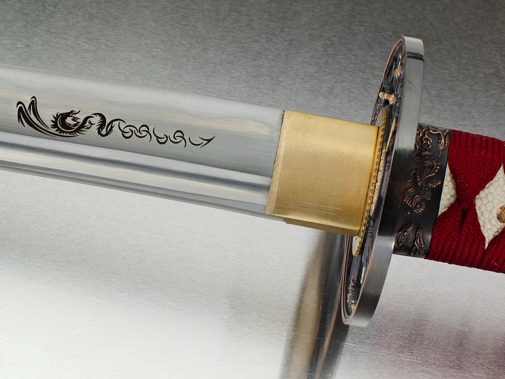 Laser engraving on a katana blade: tribal dragon #Terressens