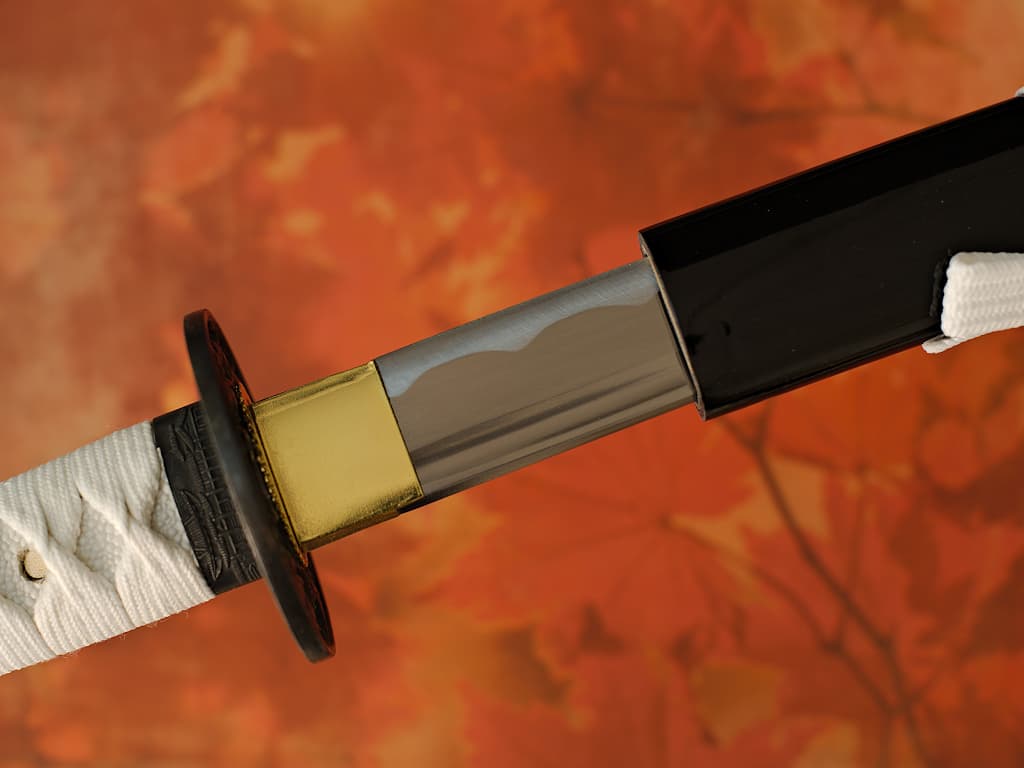 Mù-jīn, sharpened wakizashi wood (mù, 木) metal (jīn, 金): detail of the blade emerging from its scabbard (saya), resting on natural bamboo Ikigaï, sharpened katana (生き甲斐 raison d'être, meaning of life) #Terressens