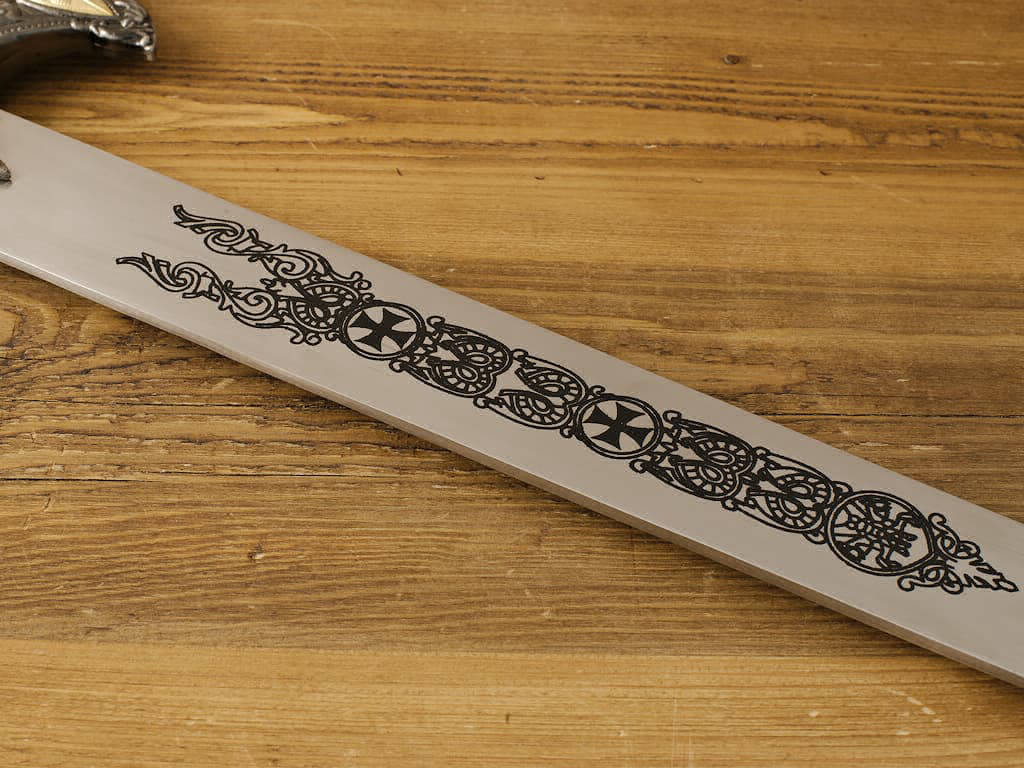 Detail of the decoration on the blade of the "Knight of Christ" Templar sword.