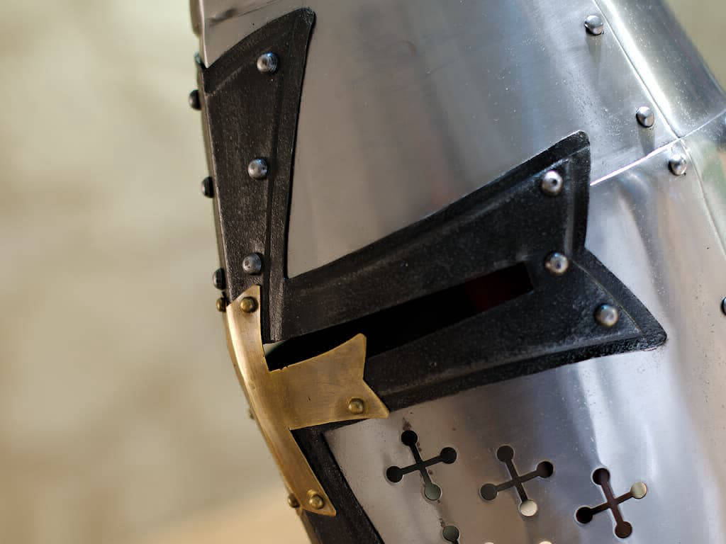 Templar helmet in steel, black cross and brass (detail of Templar crosses) Templar helmet in steel, black cross and brass (detail of Templar crosses)