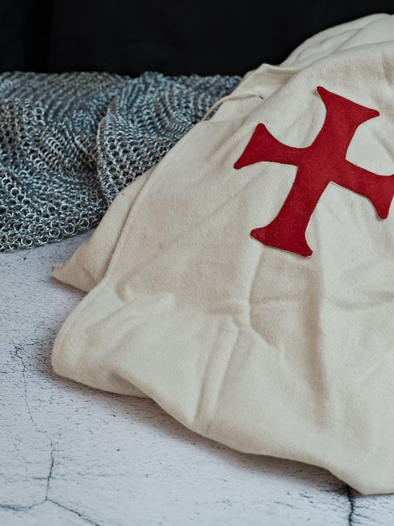 Templar tabard with medieval battle sword on a traditional wooden table Templar cape #Terressens